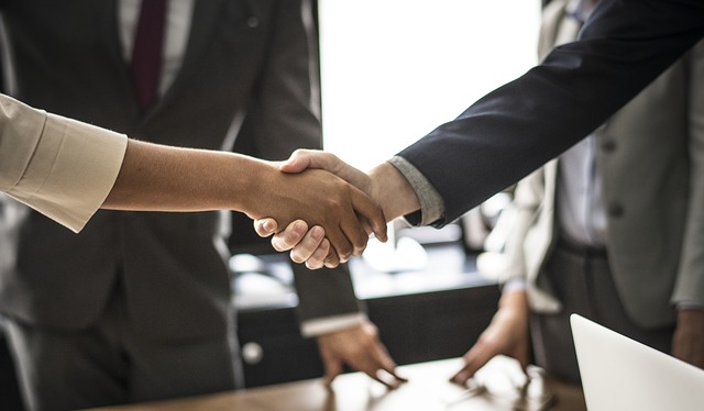 Closeup of handshake at business meeting